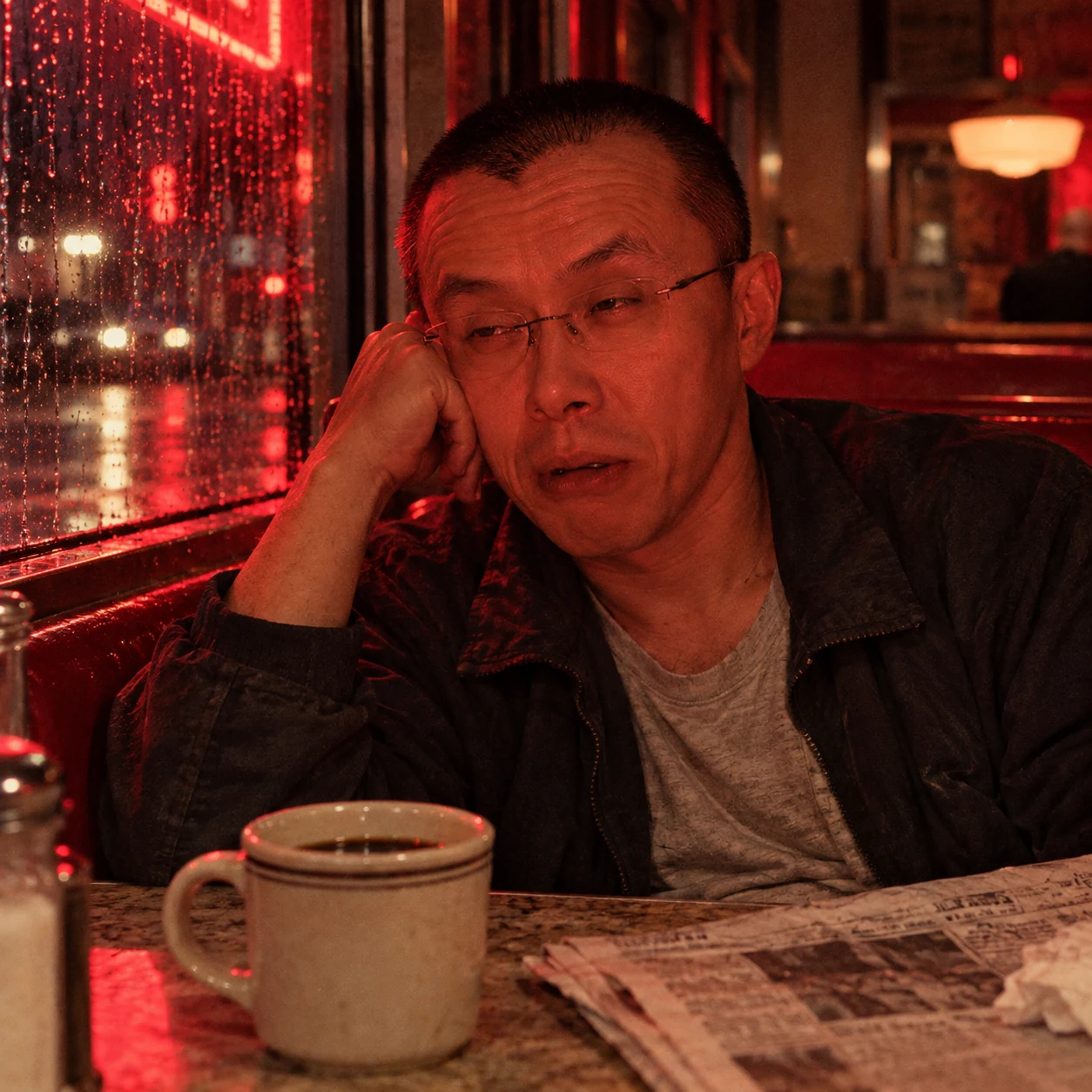 Red Morning in a booth at an all-night diner